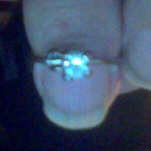size 4 silver and topaz ring